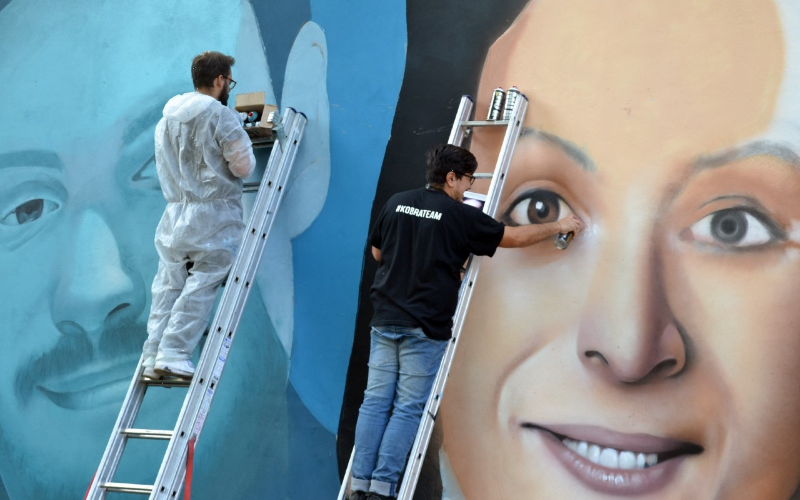 Photo of Street art, compare a Milano il murale omaggio a Giulio Regeni e Valeria Solesin